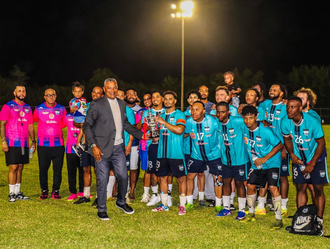 Elite Sports Club squad celebrating the 2025/26 Cayman Premier League title